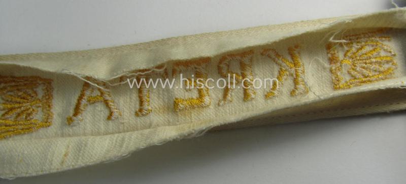 WH cuff-title (ie. 'Ärmelstreifen') entitled: 'Kreta' (being an example that bears a printed 'RbN.'-numeral) and that comes in a surely issued albeit simply never worn nor once tunic-attached, condition