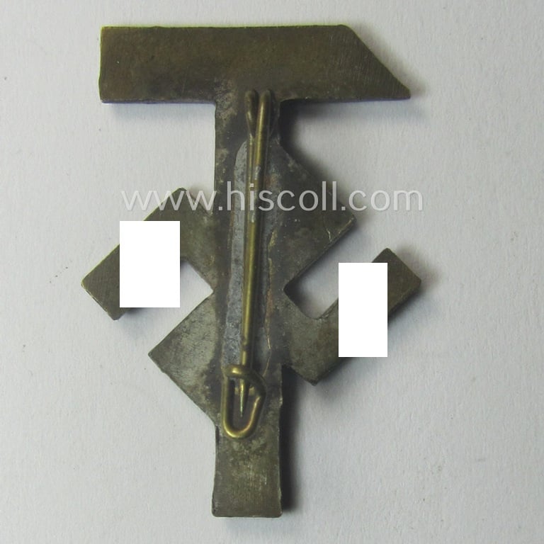Commemorative, lapel-pin (ie. 'Veranstaltungsabzeichen') being a non-marked example as executed in golden-bronze-toned 'Buntmetall' depicting a hammer-/swastika-device coupled with the text: '1. Mai 1933'