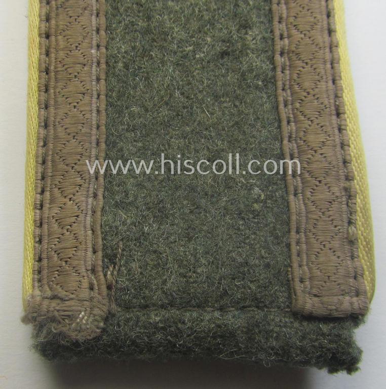 Single, mid-war-period, so-called: 'M43'-pattern, WH (Heeres) NCO-type shoulderstrap as piped in the bright-yellow-coloured branchcolour as was intended for usage by an: 'Uffz. der Nachrichten-Trpn.'