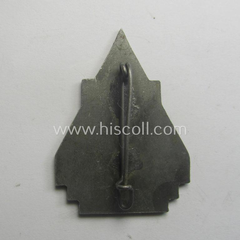 Dutch NSB-party- (ie. WA)-related lapel-pin (ie. 'Veranstaltungsabzeichen' ie. tinnie) that is executed in zinc-based metal and that is depicting the text: 'WA-Voorjaarsmarsch - Heerban 11/12'