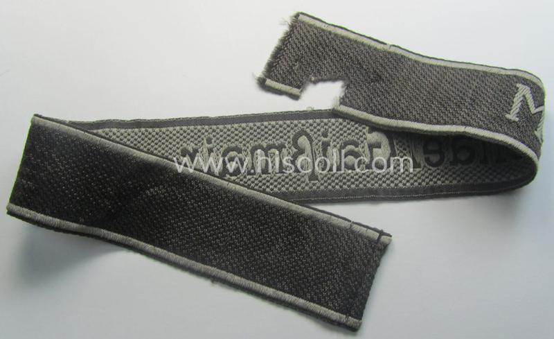 Truly used and/or worn - albeit regrettably somewhat damaged! - Waffen-SS cuff-title (ie. 'Ärmelstreifen') as executed in neat 'BeVo'-weave pattern as intended for a member serving within the: 'SS-Geb.Jäger-Regiment 12' - "Michael Gaißmair"