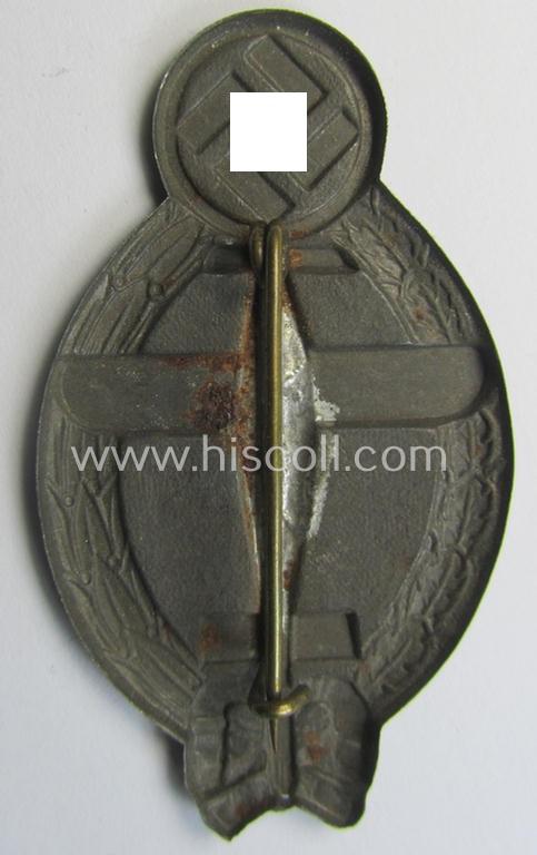 Commemorative - and never before by me encountered! - hollow-back- and/or greyish-silver-toned, so-called: 'Flieger'-related day-badge (ie. 'tinnie') being a non-maker-marked example showing a swastika and plane