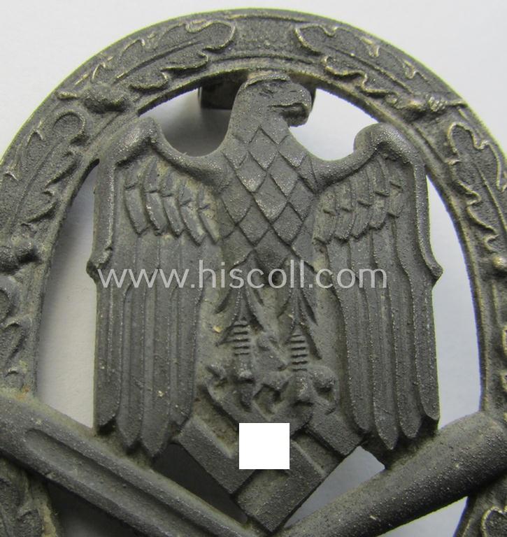 'Allgemeines Sturmabzeichen' being a non-maker-marked, zinc- (ie. 'Feinzink'-) based example by: 'C.E. Juncker'