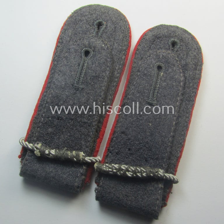 Truly used - and fully matching! - pair of WH (Luftwaffe) NCO-type shoulderstraps as piped in the bright-red branchcolour as was intended for a: 'Wachtmeister u. Offiziers-Anwärter der Flak-Art.-Trpn.'