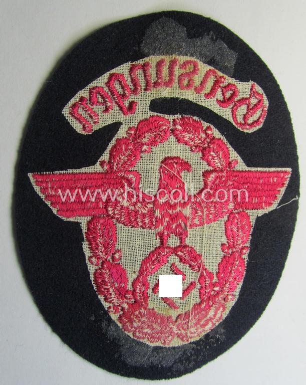 Fire-brigade (ie. 'Feuerwehr'-related-) armbadge (ie. arm-eagle) - being a scarcely encountered, regular-pattern- and/or woolen-based version that was intended for usage by a member serving within the: 'Feuerwehr Gensungen'