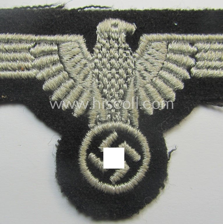 Mid- (ie. later-war-) pattern, 'SS' (ie. 'Waffen-SS') so-called: 'RzM-style' enlisted-mens'-/ie. NCO-pattern arm-eagle as was intended for usage by the various Waffen-SS troops throughout the war