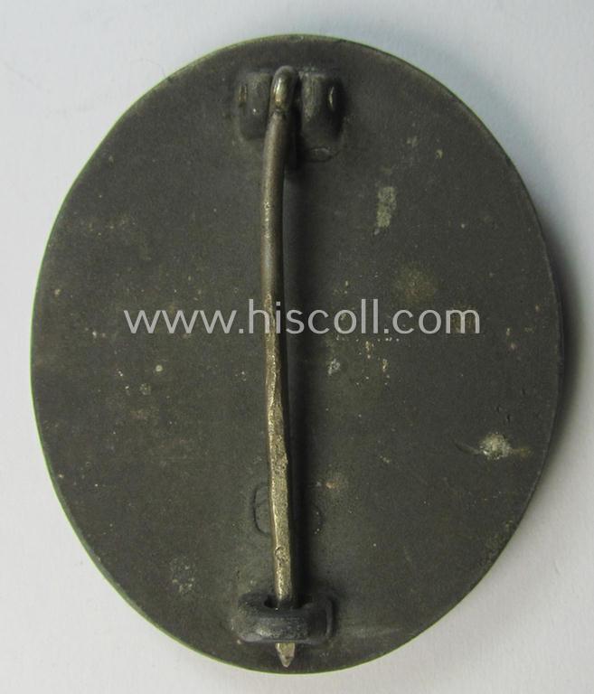 Attractive - and moderately used- and worn! - example of a maker- (ie. '65'-) marked example of a silver-class wound-badge (or: 'Verwundeten-Abzeichen in Silber') as was produced by the 'Hersteller' ie. maker: 'Klein u. Quenzer'