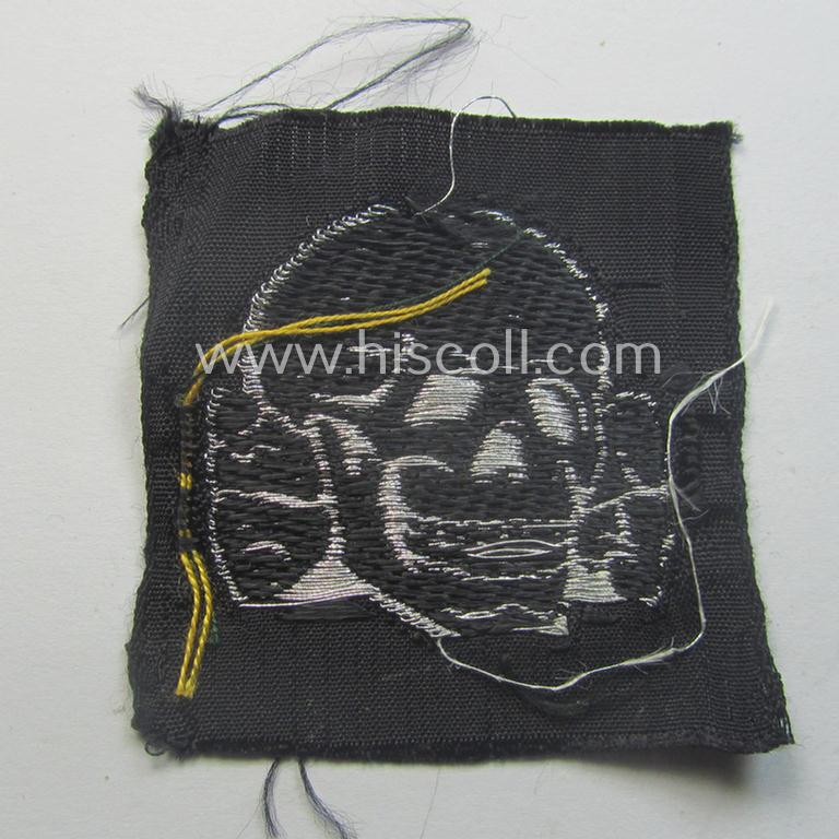 Stunning - and rarely encountered! - Waffen-SS, officers'-pattern, 'BeVo-flatwire'-woven-style skull (ie. 'Totenkopf für Offz.-Schiffchen o. Einheitsfeldmütze') that comes in a never used- (ie. still 'virtually mint ie. unissued'-), condition