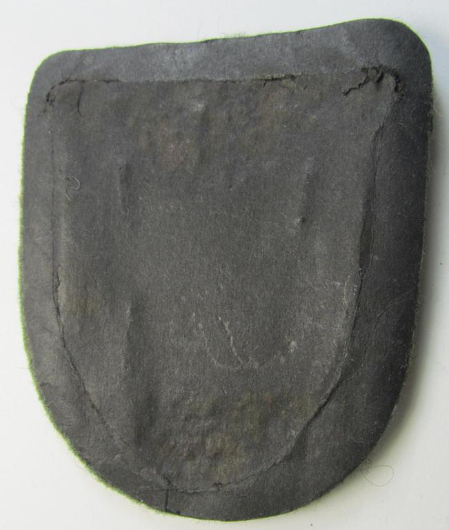 Attractive - albeit minimally rust-stained - WH (Heeres ie. Waffen-SS) 'Krim'-campaign-shield (as was produced by a by me unidentified maker) and that comes in a presumably issued - albeit 'virtually mint', condition