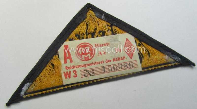 'HJ' ('Hitlerjugend') district-triangle (ie. 'Gebietsdreieck') entitled: 'Reichs-deutsche Jugend Ausland' being a 'virtually mint- ie. unissued' specimen that retains its 'RzM'-etiket