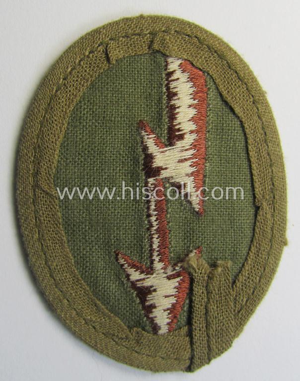 WH (Heeres) 'tropical-styled', trade- and/or special-career insignia (or: 'Signal Blitz') as was intended for a soldier who served within the: 'Kradschützenbtle. der Pz. Div. u. Inf. Divisione (mot.)'