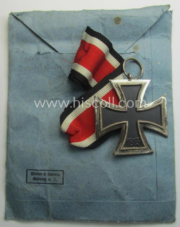 'Eisernes Kreuz II. Klasse' being a non-maker-marked example by the maker (ie. 'Hersteller'): 'Walter & Henlein' that comes stored in its period, 'Zellstoff'-based pouch