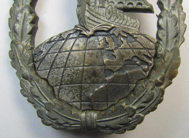 Attractive, WH (Kriegsmarine) 'Hilfskreuzer-Kriegsabzeichen' (or: auxiliary-cruiser war-badge) being a typical, non-maker-marked- and/or: 'Feinzink'-based example as was produced by the: 'S&L'-company