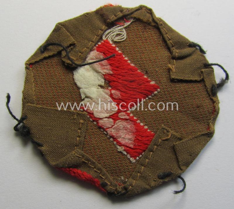 DJ (ie. 'Deutsches Jungvolk') arm-badge as was specifically intended for usage by a member who served within the: 'Oberbann 1' (being a moderately used- and carefully shirt-removed example that is void of an 'RzM'-etiket)