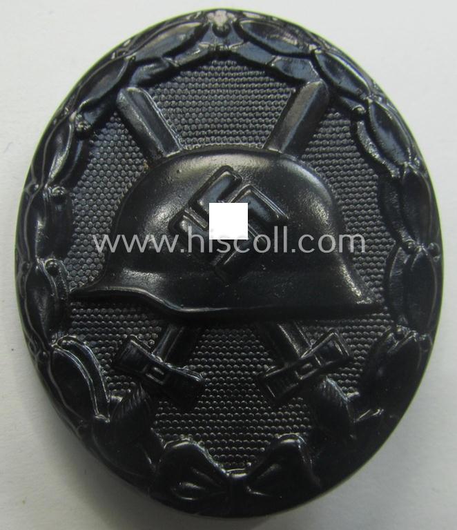 'Verwundeten-Abzeichen in Schwarz' being a maker- (ie. 'L/16'-) marked example by the: 'Steinhauer & Lück'-company that came stored in its (scarcely seen!) period pouch