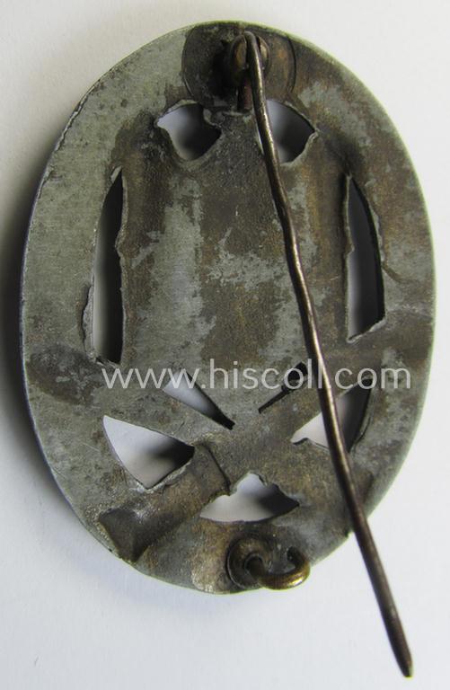 'Allgemeines Sturmabzeichen' (or: General Assault Badge ie. GAB) being a typical unmarked, zinc-based- (ie. 'Feinzink'-) and/or: 'semi-hollow-back'-version as was (I deem) produced by the: 'Rudolf Karneth'-company