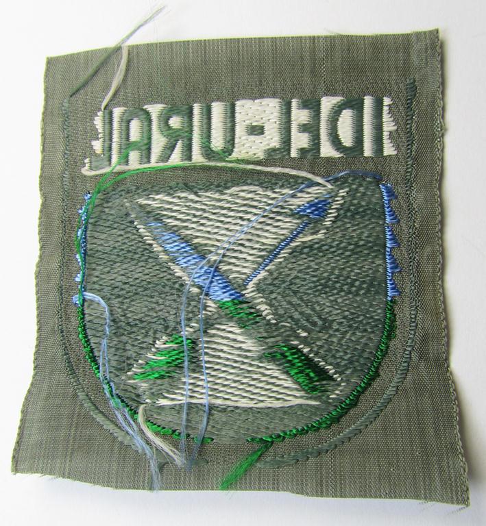 Multi-coloured- and/or 'BeVo'-woven armshield (ie. 'Ärmelschild') entitled: 'Idel-Ural' as was intended for usage by a volunteer who served within the 'Volga-Tartar Legion') and that comes in a 'virtually mint- ie. unissued', condition