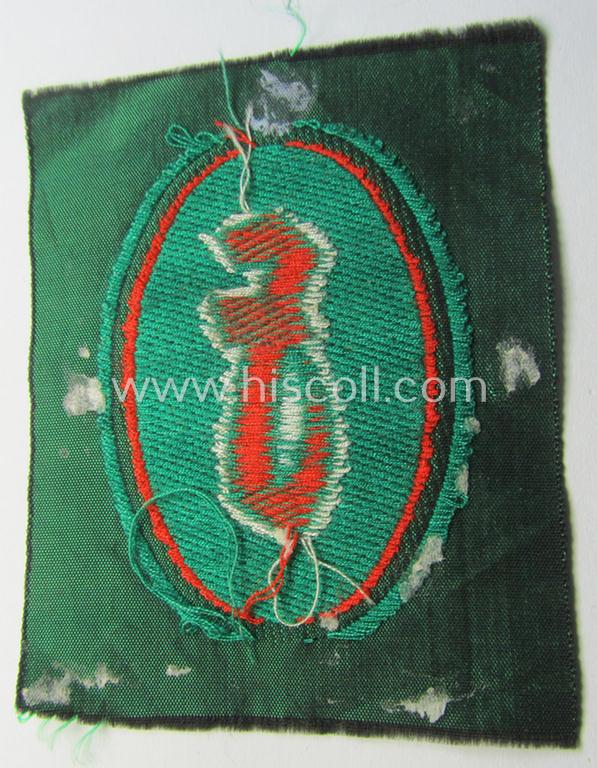 Attractive, 'Sicherheits- u. Hilfsdienst (SHD)' armbadge (ie. 'Ärmelabzeichen') as executed in 'BeVo'-weave pattern, as was intended for an SHD-member who served within the: 'Feuerlöschdienst' (or: fire-extinction-service)