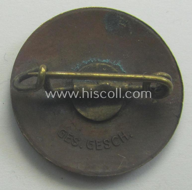 Early-pattern 'N.S.D.A.P. - Parteiabzeichen' showing a: 'Ges.Gesch.'-patent-pending-designation