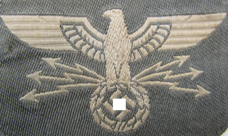 Superb, 'Postschutz'-arm-badge (ie. arm-eagle) being a piece as executed in the 'BeVo'-weave-pattern and that comes in a moderately used- (ie. clearly tunic-removed-), condition