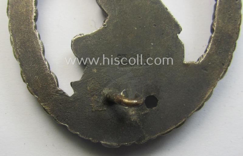 WH (Luftwaffe) 'Flakkampfabzeichen' being a detailed 'Buntmetall'-based and (unusually seen!) non-maker-marked example as was produced by the: 'C.E. Juncker'-company and that comes as moderately worn