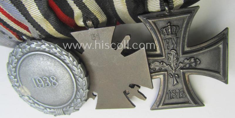 Unusually found, 3-pieced WWI- (ie. TR-) period medal-bar (ie. 'Ordenspange') respectively depicting a WWI-period: 'EKII.Kl.', a: Frontkämpferkreuz 1914-18' (ie.: 'Kriegsteilnehmerkreuz mit Schw.') and a: 'Luftschutz-Ehrenzeichen 2. Stufe'