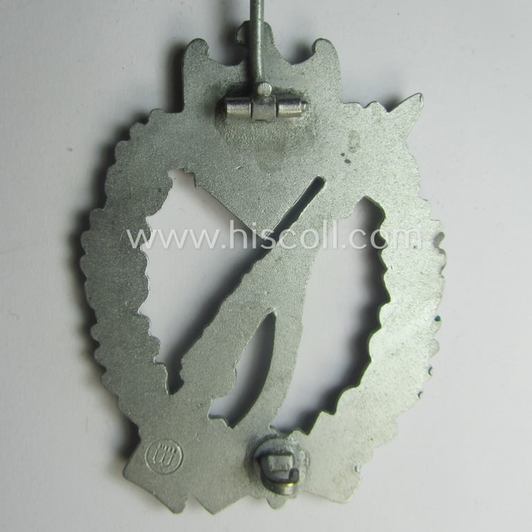 Superb, 'Infanterie Sturmabzeichen in Silber' (or: silver-class infantry assault-badge ie. IAB) being a maker- (ie. 'ÜÜ'- ie. 'E.F. Wiedmann') marked so-called: 'Lily Pad-hinge'-example as was executed in zinc-based metal