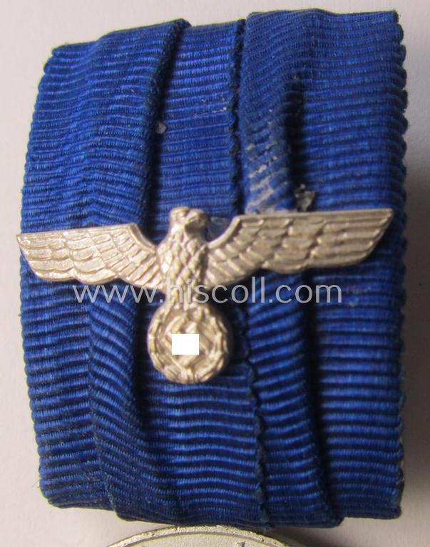 Attractive, silver-toned & detachable WH (Heeres o. KM) so-called: 'Einzelspange' showing a: 'WH-Dienstauszeichnung 4. Stufe' (as was intended for 4 years of loyal-service) and that shows a detailed, Heeres o. KM-type-eagle-device, period-attache...