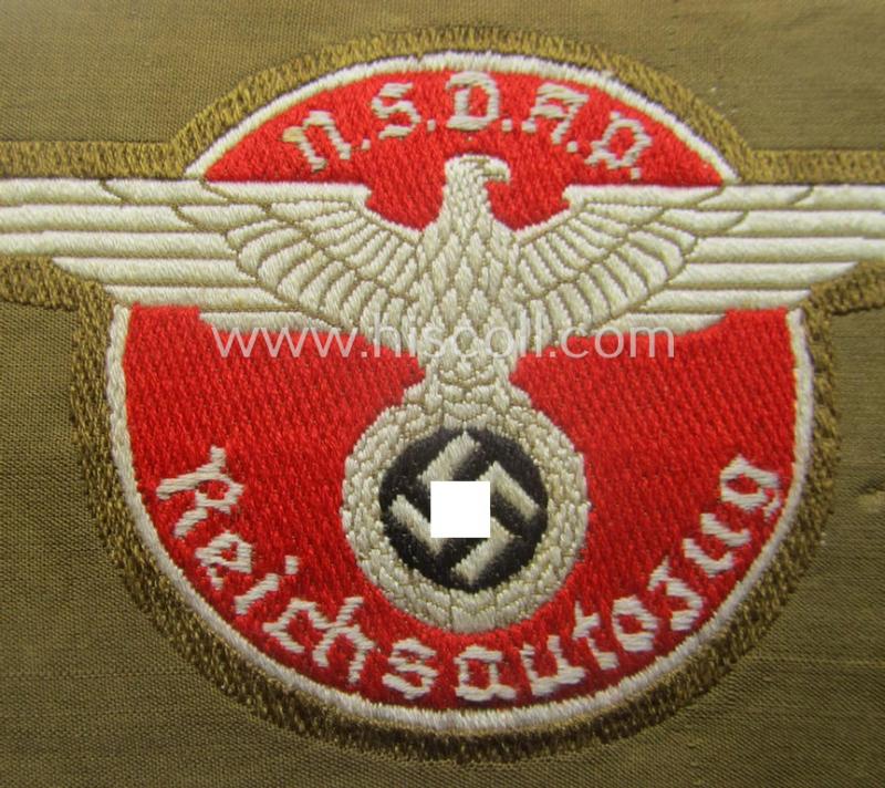 Breast-badge as executed in 'BeVo-weave' pattern as was intended for members within the 'N.S.D.A.P. Reichsautozug' (or: 'RaZ') still retaining its period, paper-based 'RzM'-etiket