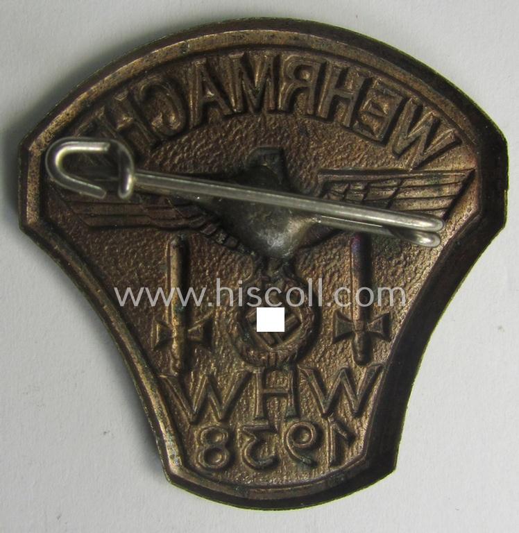 Golden-bronze-toned, W.H.W.- (ie. 'Winterhilfswerke'-) related day-badge (ie. 'tinnie') being a non-maker-marked example as was issued to commemorate the: 'WHW'-gathering ie. rally entitled: 'Wehrmacht - WHW - 1938'