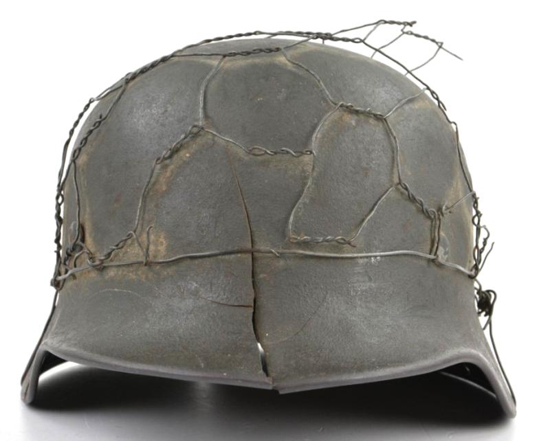 German WH M40 SD Combat Helmet with Battle damage and Half Wire Basket