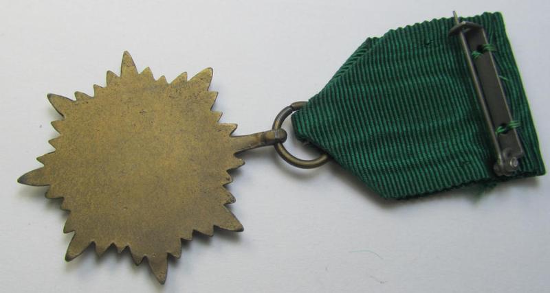 WH-related so-called: 'Tapferkeitsauszeichnung für Angehörige der Ostvölker, 3. Klasse in Bronze mit Schwerter' (being a non-maker-marked- and/or: 'Feinzink'-based example that comes mounted onto its period ribbon)