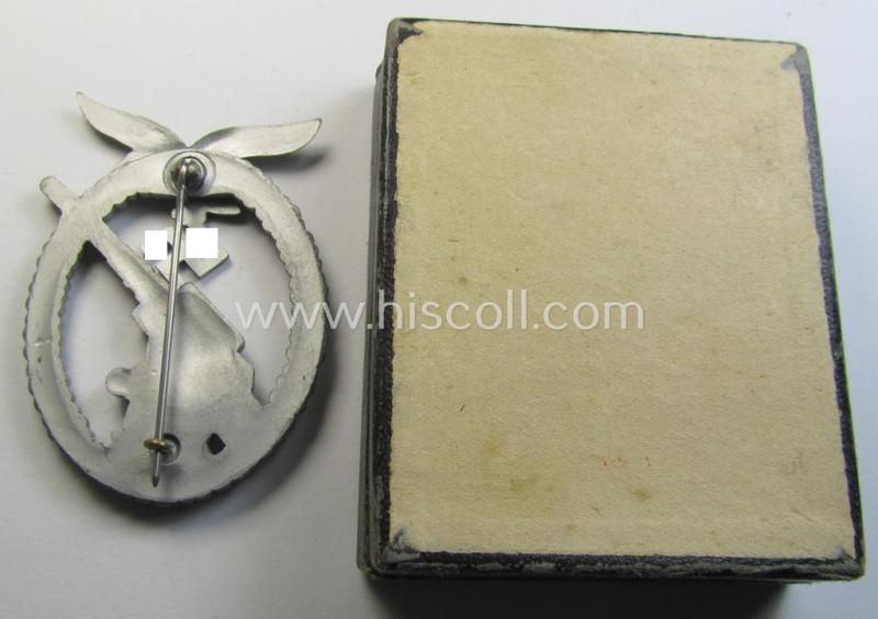 Attractive - and actually not that often seen! - later-war-period, 'Feinzink'-based example of a WH (Luftwaffe) 'Flakkampfabzeichen' (as was produced by a to date unknown maker and that comes stored in its typical etui)