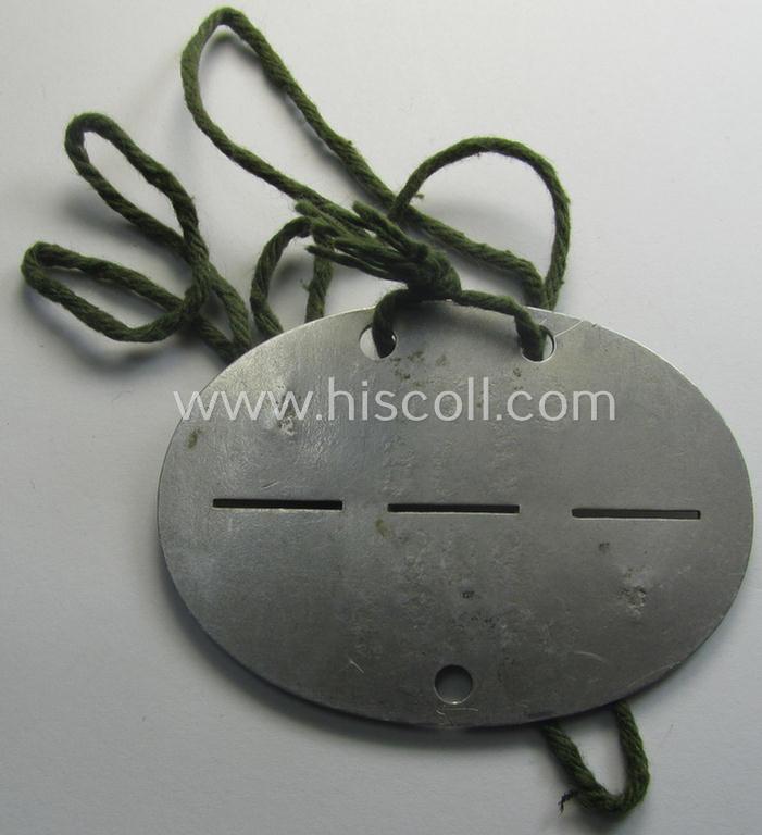 Aluminium-based, WH (LW) ie. 'Fallschirmjäger'-related ID-disc bearing the clearly stamped- and/or: 'coded'-unit- ie. 'MOB'-designation that reads: '62769' (and as such belonging to the: '7./Fsch.Jg.Rgt. 3')