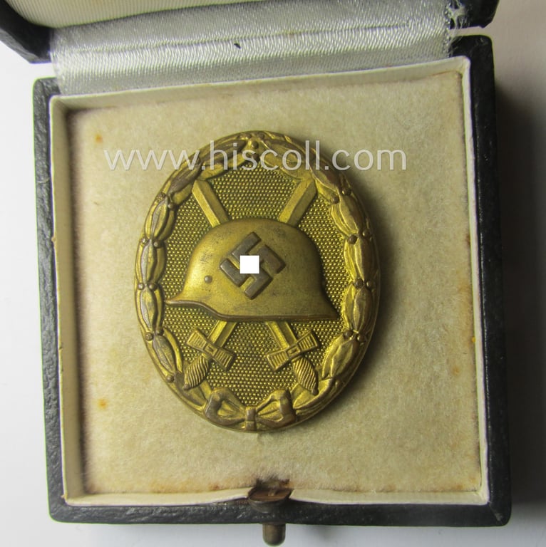 'Verwundeten-Abzeichen in Gold' being a non-maker-marked- and typical 'Buntmetall'-based (ie. 'thin-pinned'!) example that comes stored in its maker- (ie. 'Hauptmünzamt - Wien'-) marked etui as issued