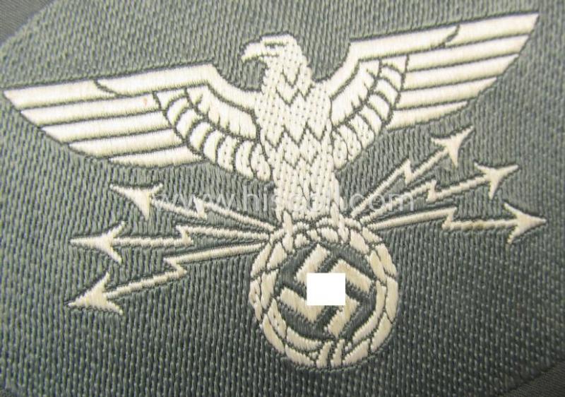 Superb, 'Postschutz' arm-badge (ie. arm-eagle) being a piece as executed in the 'BeVo'-weave-pattern and that comes in a 'virtually mint- ie. unissued', condition