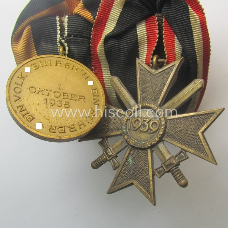 Moderately used, two-pieced medal-bar (ie.: 'Orden- o. Doppelspange') resp. showing a: 'KvK 2. Klasse mit Schw.' and a WH Czech 'Anschluss'-medal: '1. Oktober 1938'