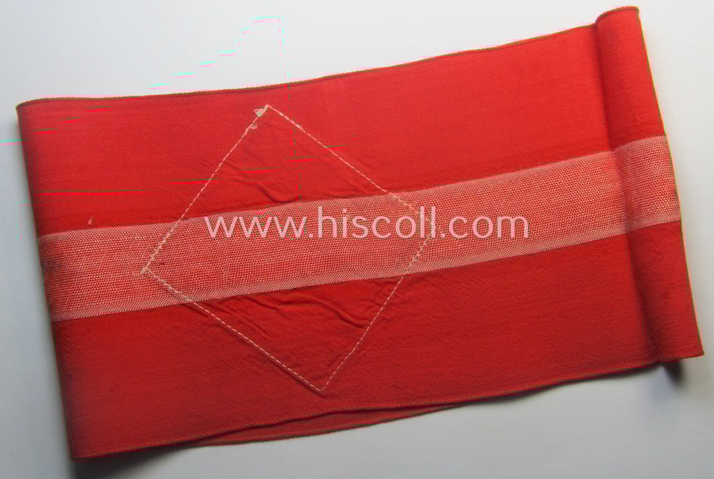'Standard-issued'-pattern (ie. entirely woven) pattern, bright-red-coloured HJ- (ie. 'Hitlerjugend'-) related armband (ie. 'Armbinde') being a moderately worn- ie. used example that misses its 'RzM'-etiket