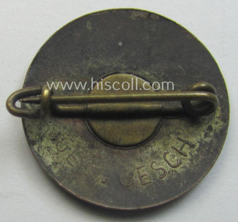 Early-pattern 'N.S.D.A.P. - Parteiabzeichen' showing a: 'Ges.Gesch.'-patent-pending-designation