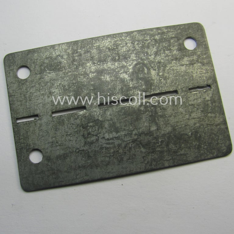 Unusually found, zinc-based WH (Heeres) 'Frontstalag'- (ie. prisoner-related-) ID-disc bearing the clearly stamped camp-designation that reads: 'Frontstalag 306' and that comes as issued- and/or worn
