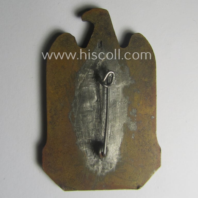 Period-repaired, N.S.D.A.P.-related 'tinnie' (ie. 'Tagungs- o. Veranstaltungsabzeichen'-) being a non-maker-marked, 'solid-back'-pattern and/or golden-bronze-toned example showing the text: 'N.S.D.A.P. Reichsparteitag - Nürnberg 1933'
