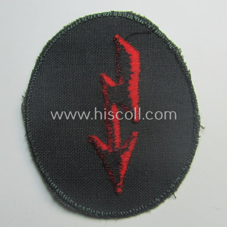 Thin-shaped- ie. 'variant'-pattern, WH (Heeres) trade- and/or special-career insignia ie. machine-embroidered signal-blitz (being a non-maker-marked example as executed in bright-red) as intended for the: 'Artillerie-Trpn.'