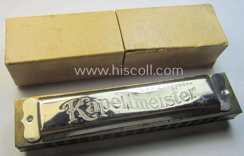 TR-era- (ie. 'Deutsche Wehrmacht'-) related harmonica entitled: 'Der Kapellmeister' that came stored in its original and/or carton-based box ie. etui