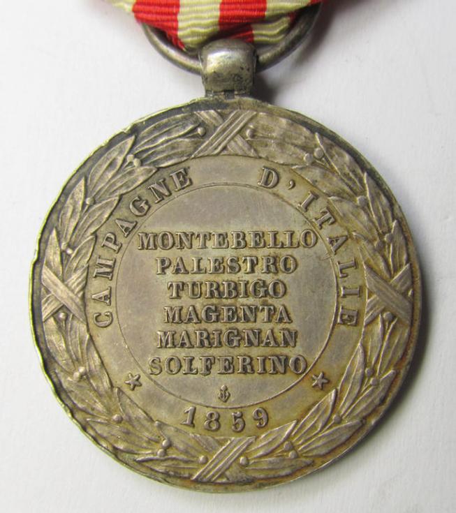 Attractive French, 'Second Empire-period', so-called: 'Expedition to Italy'-campaign-medal (ie. 'Médaille Commémorative de l'Expédition du Italie') that comes mounted on its period-ribbon as issued