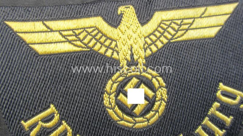 Neat, RB- ('Reichsbahn'-) related arm-eagle as executed in 'BeVo'-weave style as was intended for an official of the: 'Deutsche Reichsbahn' ie. the 'RBD Augsburg' (or: 'Reichsbahndirektion Augsburg')