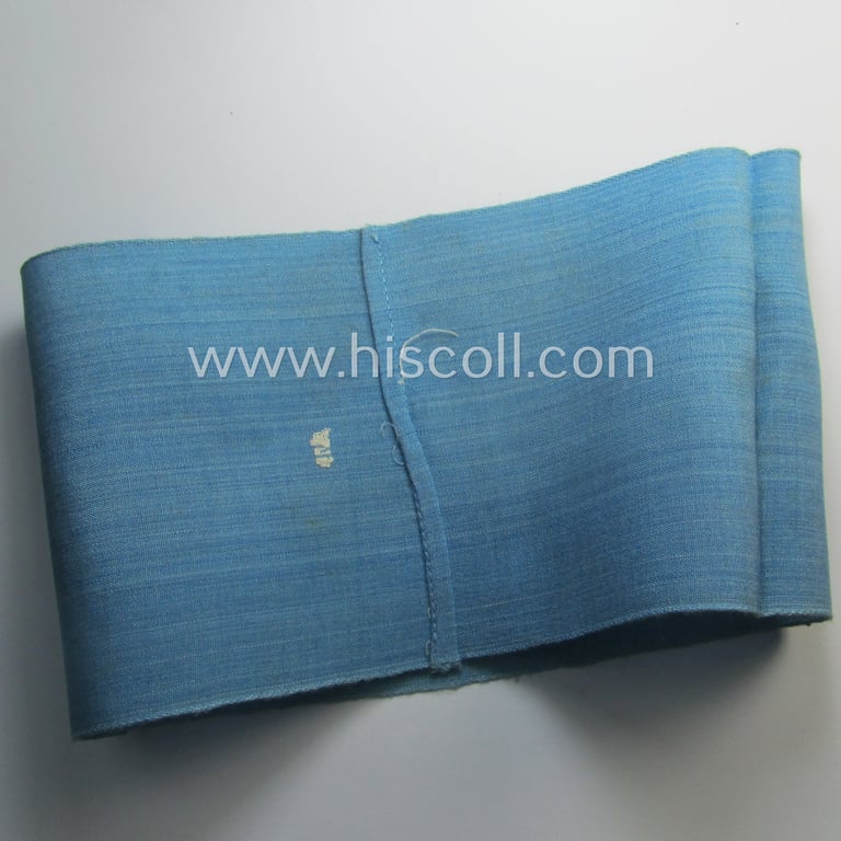 Linnen-based- and/or light-blue-coloured armband (ie. 'Armbinde') depicting an interwoven capital 'W'-character as was presumably intended for staff-members of the RLB (ie. 'Reichsluftschutz-Bund') serving as: 'RLB-Wache' (ie. air-raid-warden guard)