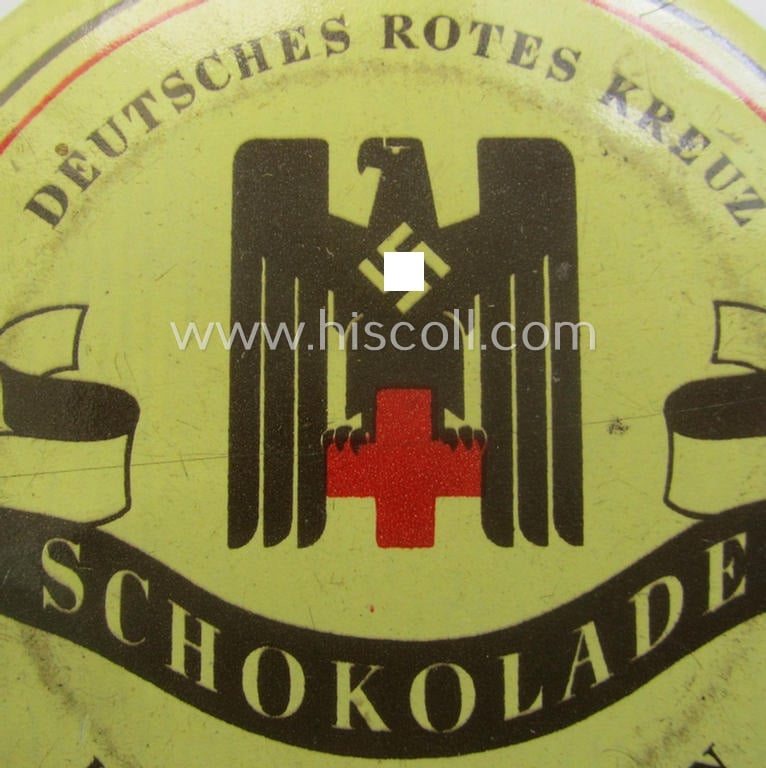 Rarely seen DRK- (ie. 'Deutsches Rotes Kreuz'-) related (emergency) chocolate ration-tin of the make: 'Hildebrand - Berlin' being of the desirable 'variant'-pattern showing the 'DRK'-eagle and text: 'Schokolade' on its front