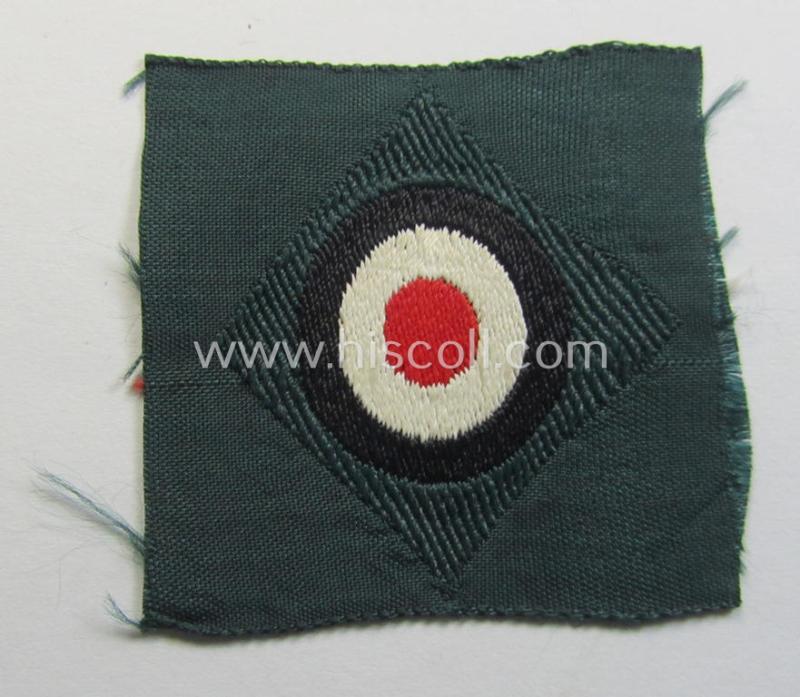 Pre- (ie. early-) war-period, WH (Heeres) cap-eagle & cocarde-set (ie. 'Schiffchenmützen-Adler u. Kokarde für Mannschaften u. Uffz.') being a 'virtually mint' set as executed in bluish-grey-coloured linnen on a darker-green-coloured background