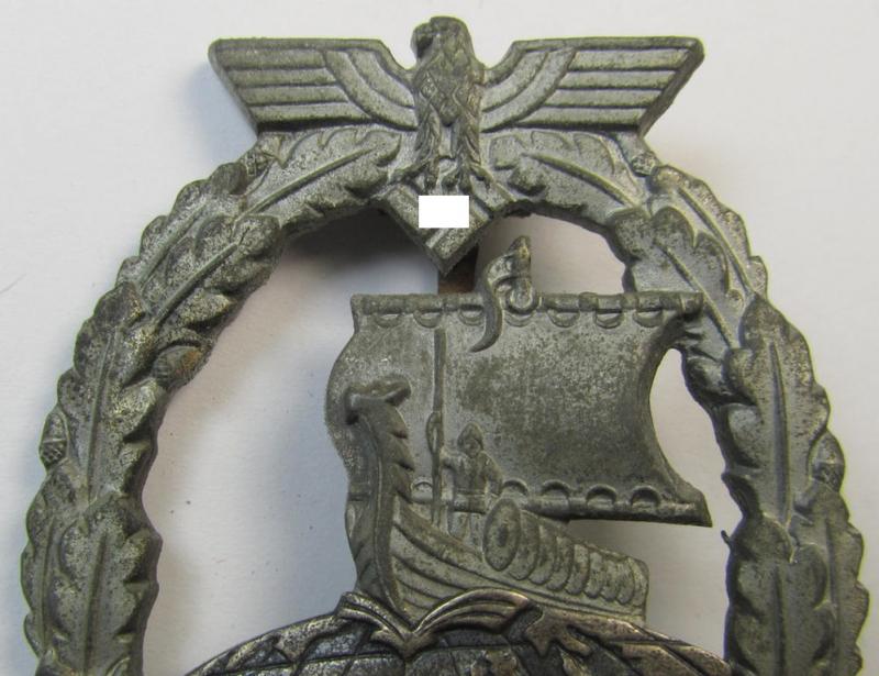 Attractive, WH (Kriegsmarine) 'Hilfskreuzer-Kriegsabzeichen' (or: auxiliary-cruiser war-badge) being a typical, non-maker-marked- and/or: 'Feinzink'-based example as was produced by the: 'S&L'-company
