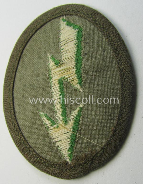 WH (Heeres) 'tropical-styled', trade- and/or special-career insignia (or: 'Signal Blitz') as was intended for a soldier who served within the: 'Panzer-Grenadier-Truppen'